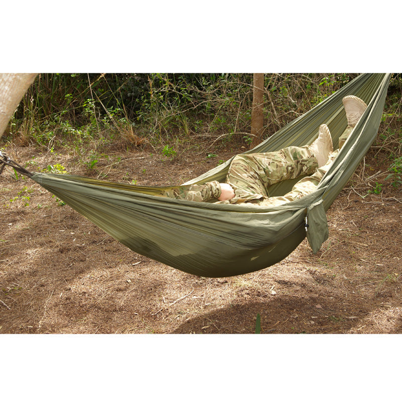 Snugpak Tropical Hammock in olive green parachute nylon with suspension system and carabiners