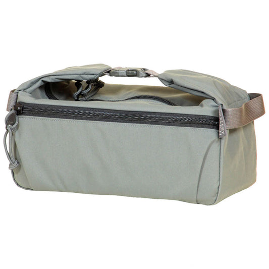 Mystery Ranch Zoid Cell foam-padded accessory bag with buckle closure and exterior zip pocket