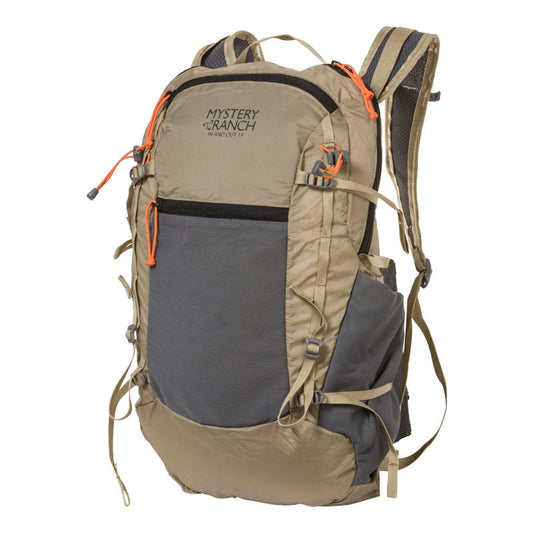 Mystery Ranch In and Out 19 black packable daypack with compression straps and tool loops for hiking and climbing