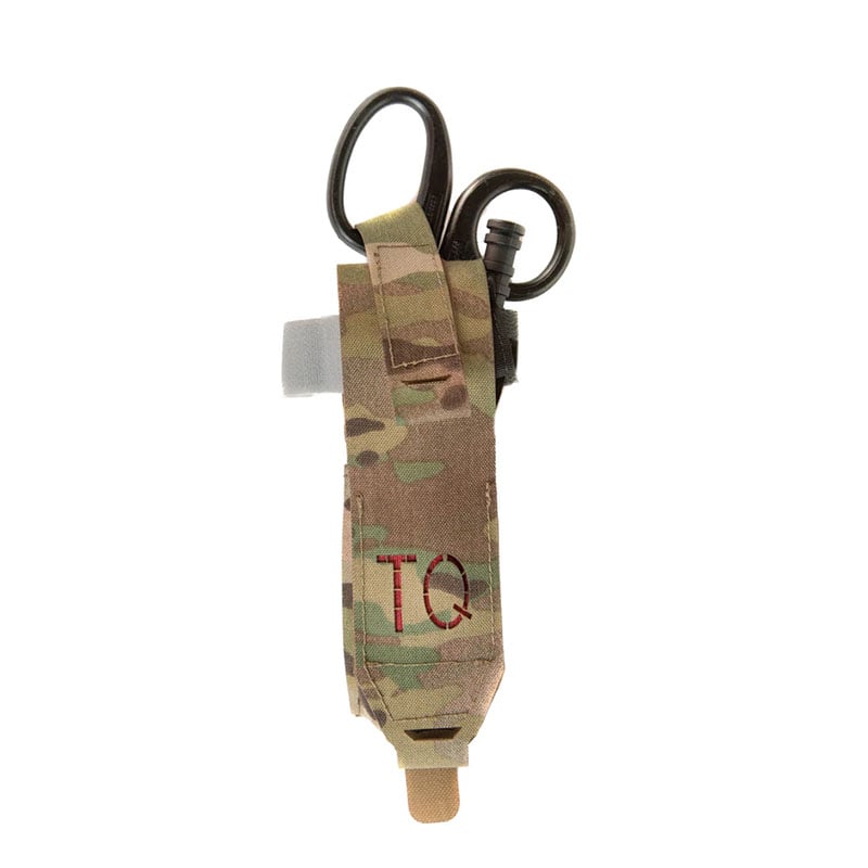 Raine Tactical tourniquet pouch with shears holder showing GRIDLOK MOLLE attachment and laser-cut TQ identification