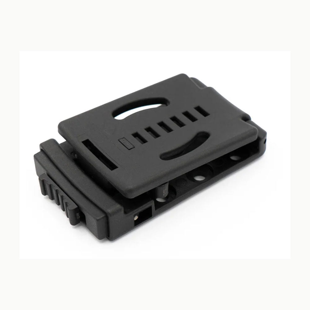 Toor Knives Ultimate Belt Attachment showing snap-lock mechanism and adjustment bar for tactical gear mounting