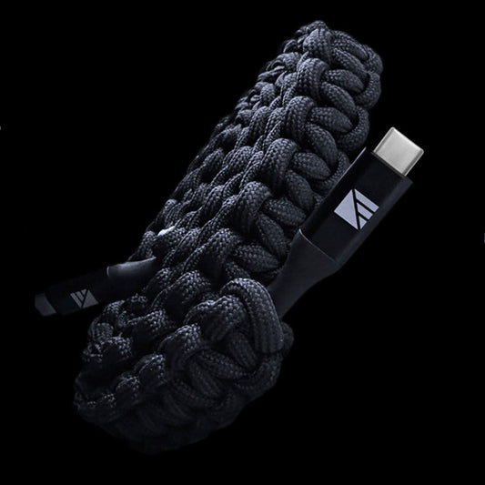 Dark Energy USB-C to USB-C cable wrapped in black paracord with metal reinforced connectors